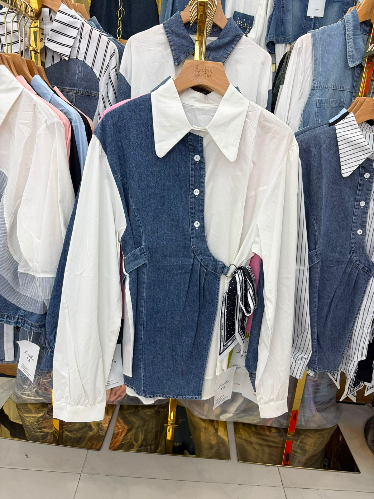 two-tone denim and button-up blouse