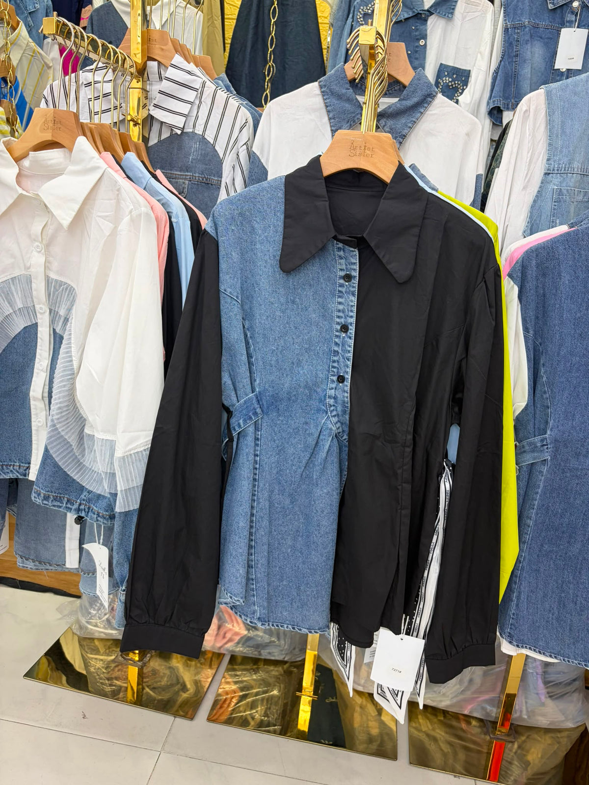 two-tone denim and button-up blouse